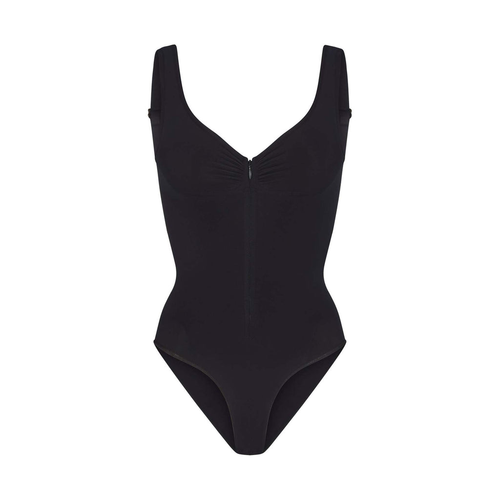 cinching belly tight fitting, zipper style shapewear