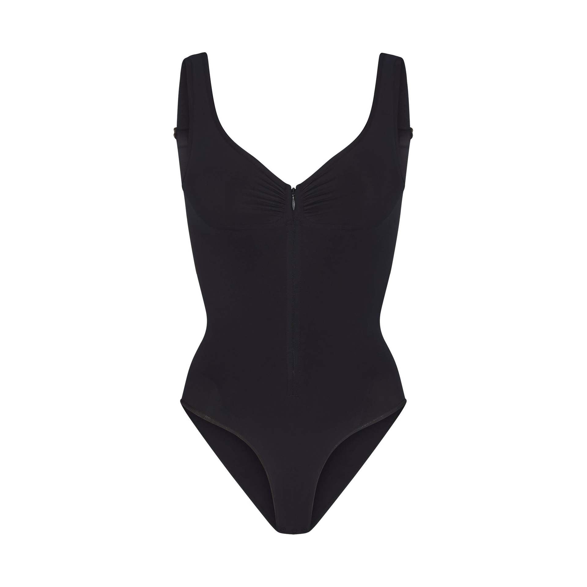 cinching belly tight fitting, zipper style shapewear