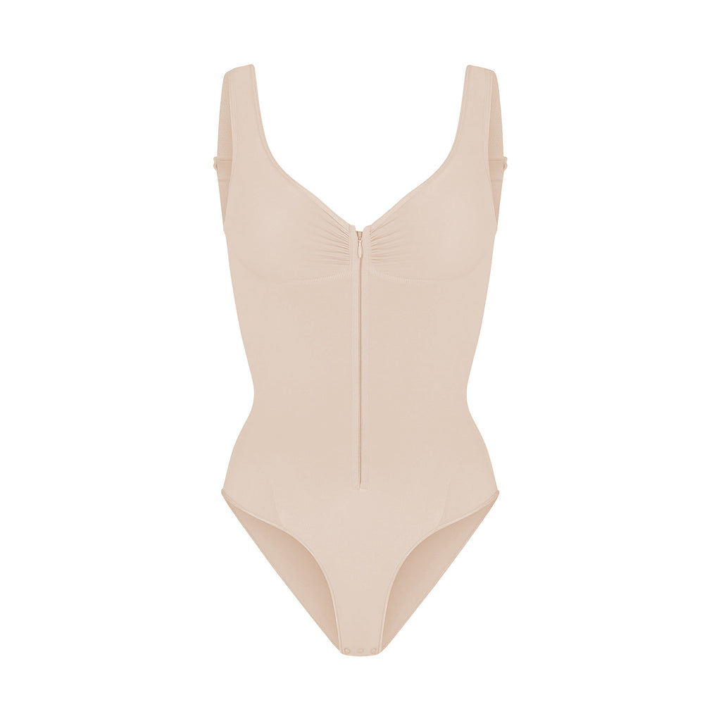 cinching belly tight fitting, zipper style shapewear