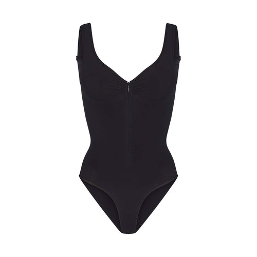 cinching belly tight fitting, zipper style shapewear