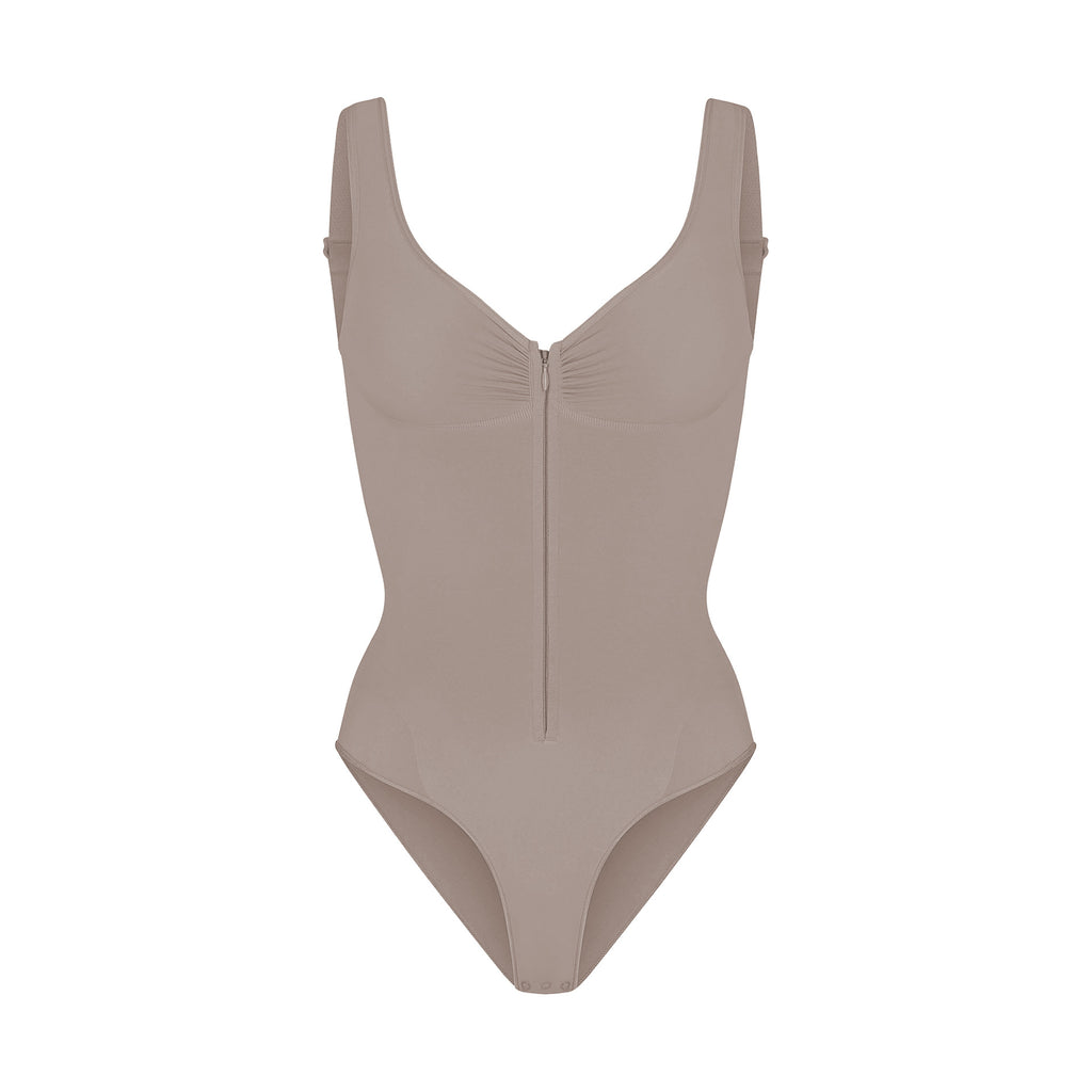 cinching belly tight fitting, zipper style shapewear