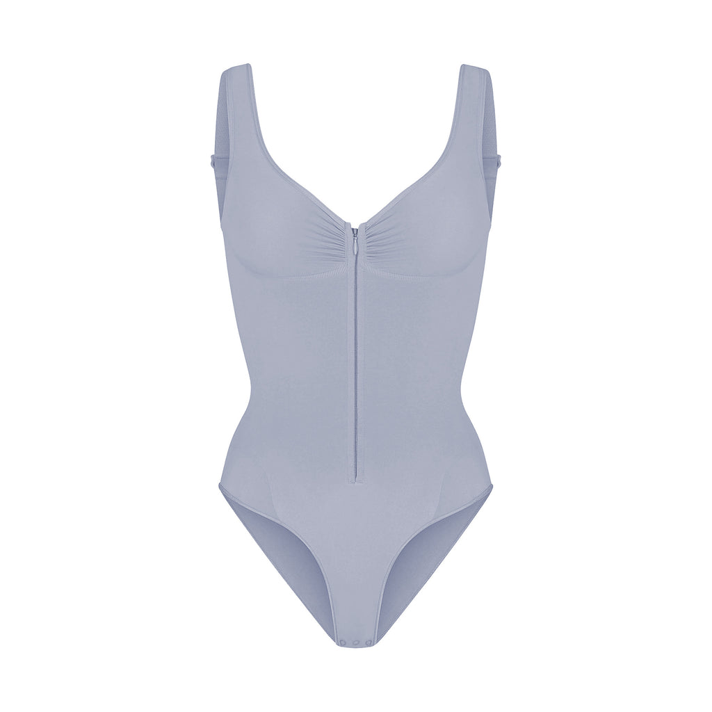 cinching belly tight fitting, zipper style shapewear